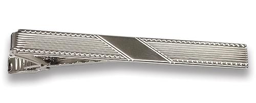 Rib Pattern with embossed wave trim edge. Diagonal polished center panel/ 2 1/2" (65mm) Polished Rhodium/ Import/ Boxed