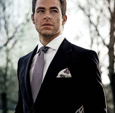 Man wearing a pocket square in a suit jacket breast pocket