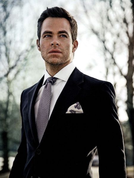 Man wearing a pocket square in a suit jacket breast pocket