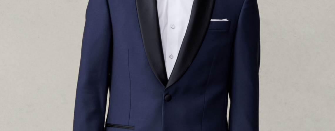 Man wearing a classic black tuxedo with bow tie