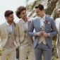 Men in wedding suits - groomsmen wearing linen suits at an outdoor wedding